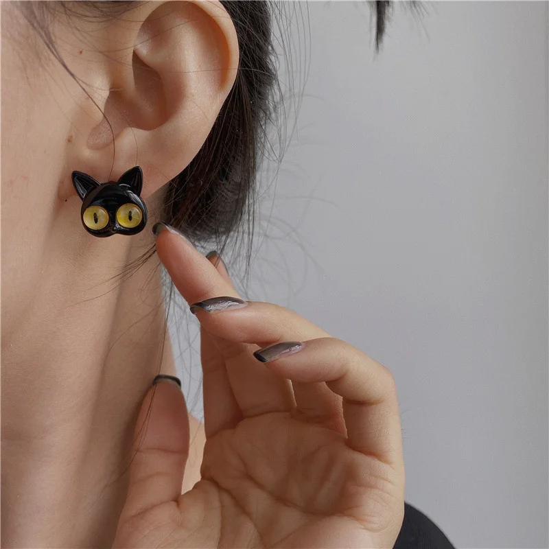 Black Cats with Yellow Eyes