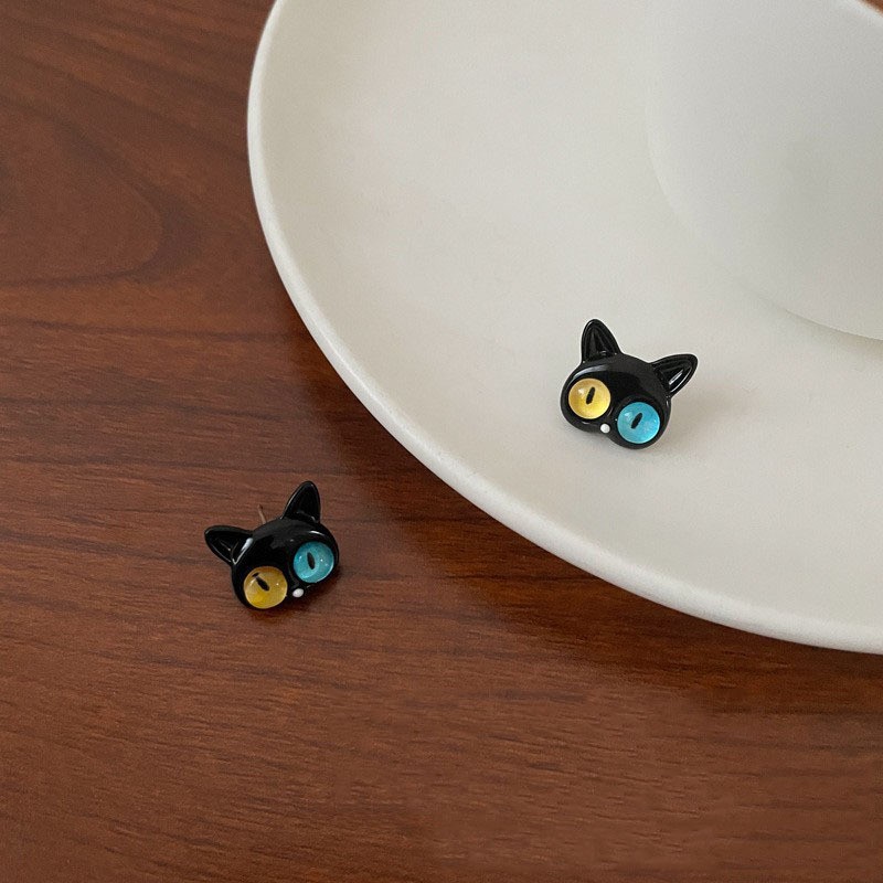 Black Cats with Blue & Yellow Eyes